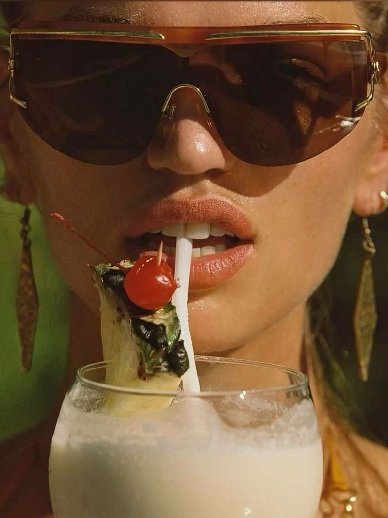 DOLCE NUDE Piña Colada Crush edible fragrance with creamy coconut drink and tropical styling